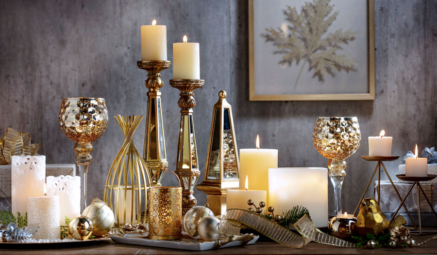 luces cálidas y velas para decorar una navidad glam