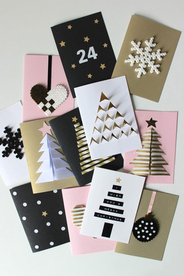 Tarjetas navideñas en colores rosa, negro, blanco y dorado, hechas a mano.